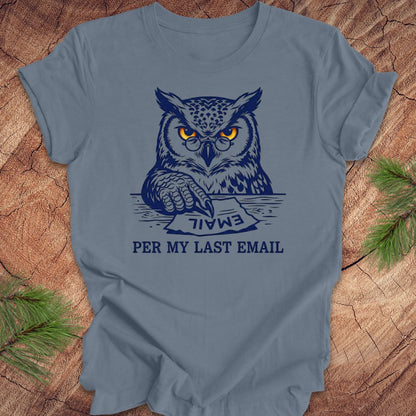 Steel blue t-shirt with an owl graphic and text, 'per my last email' on a wooden surface