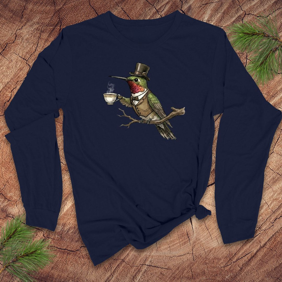 Navy blue long-sleeve shirt with a vintage hummingbird with top hat and tea design on a wooden surface.