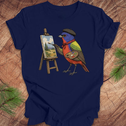 Navy blue t-shirt with a painted bunting bird painting on a wooden surface