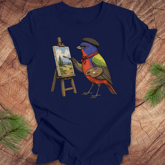 Navy blue t-shirt with a painted bunting bird painting on a wooden surface