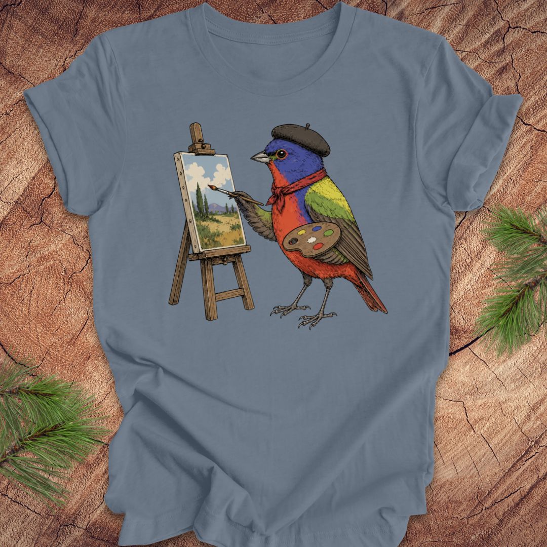 Steel blue t-shirt with a painted bunting bird painting on a wooden surface