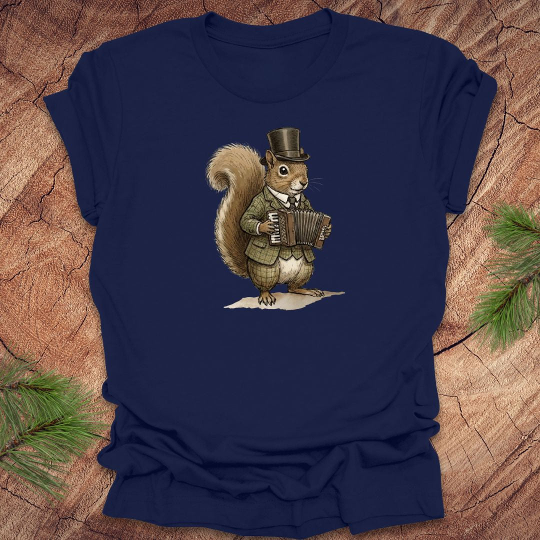 Navy t-shirt with a well dressed squirrel playing an accordion graphic on a wooden surface.