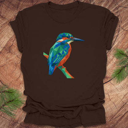 Brown t-shirt with a colorful kingfisher design on a wooden surface.