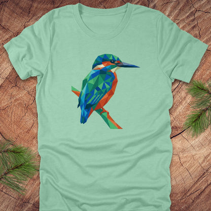 Light green t-shirt with a colorful kingfisher design on a wooden surface.