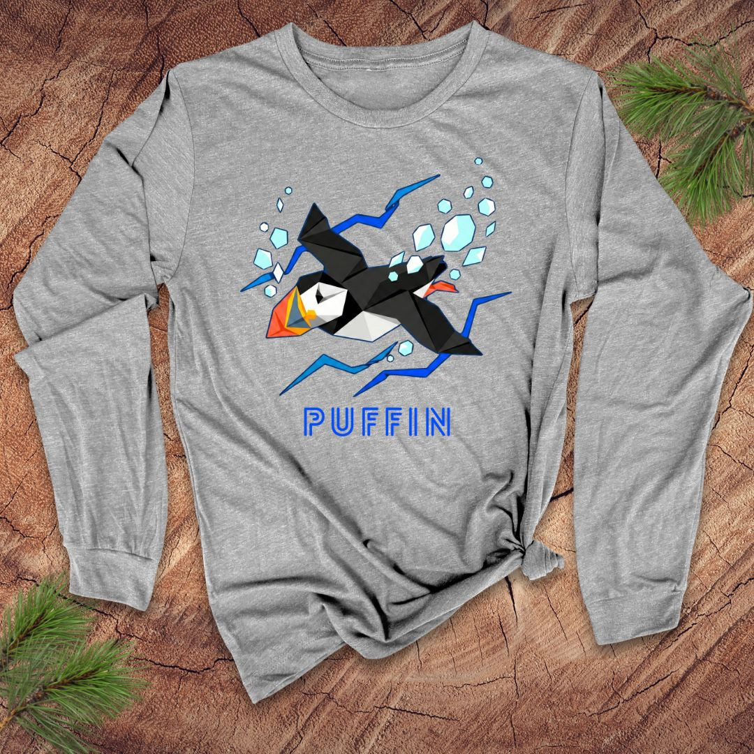 Gray long-sleeve shirt with a puffin graphic and 'Puffin' text on a wooden surface.