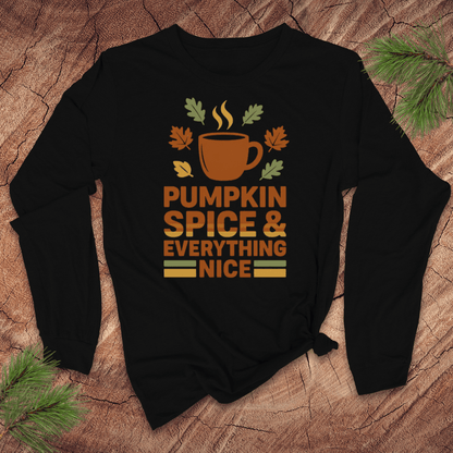 Black long-sleeve shirt with 'Pumpkin Spice & Everything Nice' design on a wooden surface with pine branches.