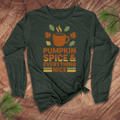 Green long-sleeve shirt with 'Pumpkin Spice & Everything Nice' design on a wooden surface.