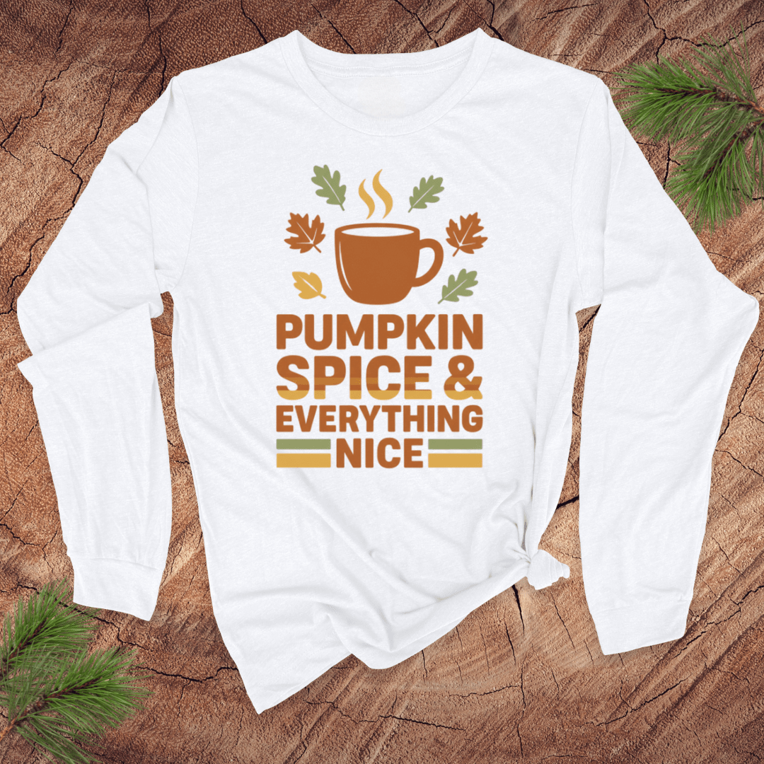 White long-sleeve shirt with pumpkin spice and everything nice graphic on a wooden surface