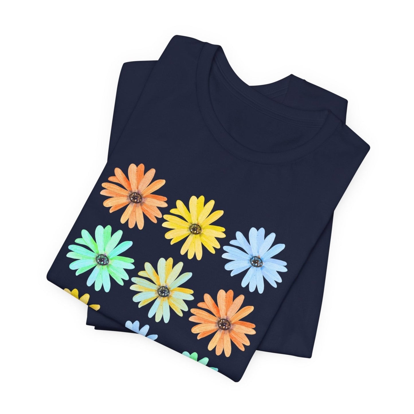 Navy blue folded t-shirt with colorful floral design on a white background