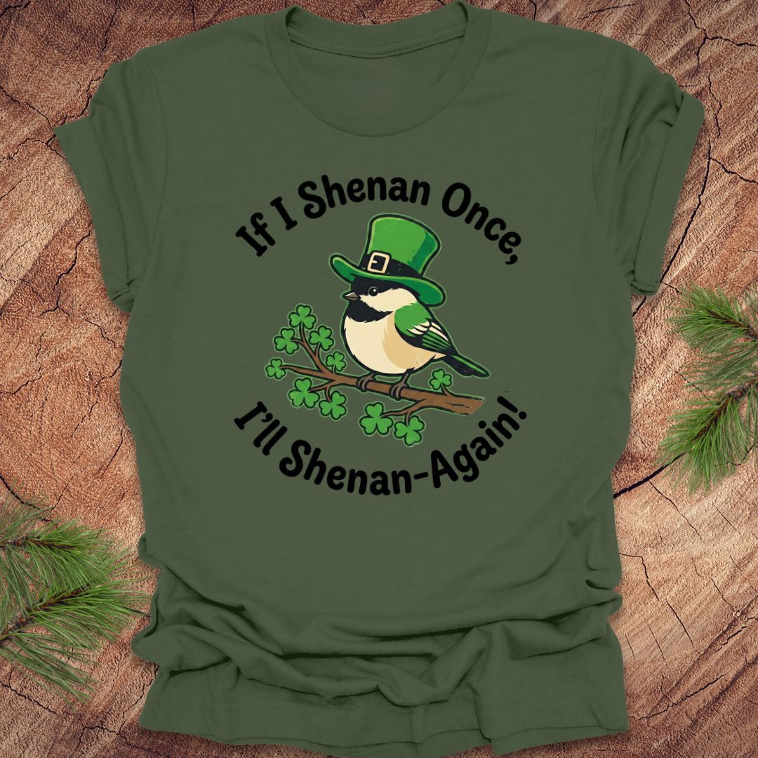 Green t-shirt with a st patrick's day bird graphic and text on a wooden surface