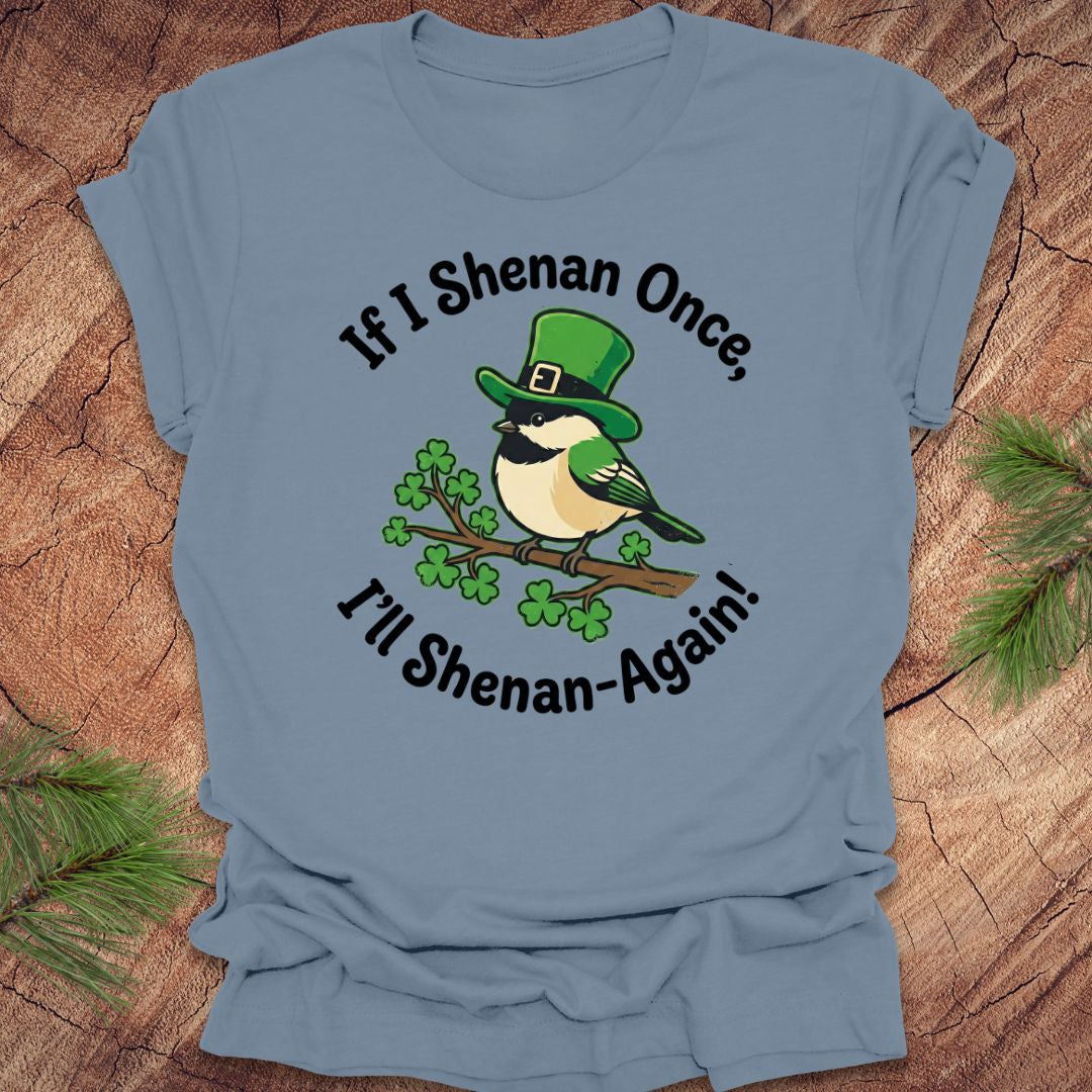 Blue t-shirt with a st patrick's day bird graphic and text on a wooden surface