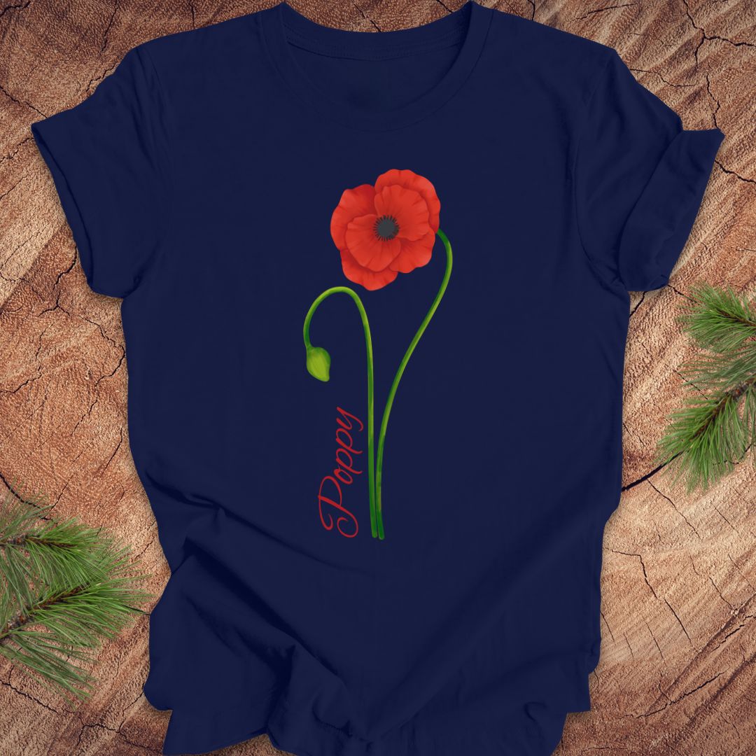 Navy blue t-shirt with a red flower and 'Daddy' text on a wooden surface