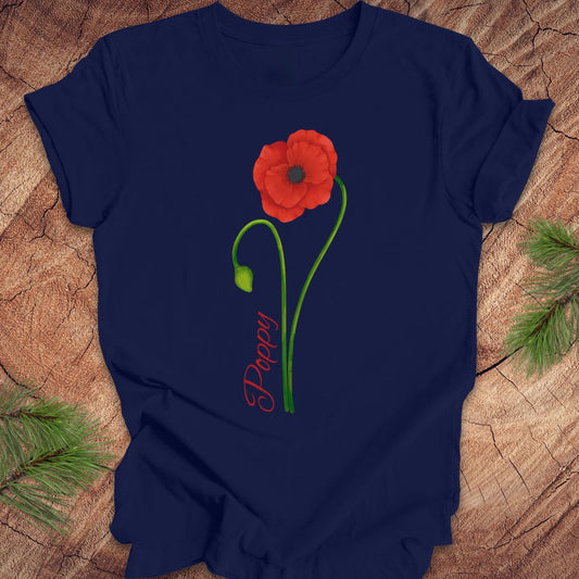 Navy blue t-shirt with a red flower and 'Daddy' text on a wooden surface