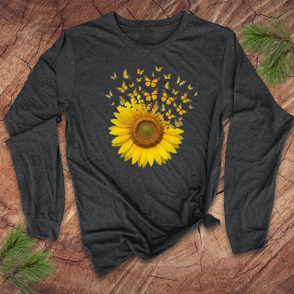 Dark gray long-sleeve shirt with a yellow sunflower design on a wooden surface