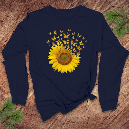 Navy blue long-sleeve shirt with a yellow sunflower and butterflies design on a wooden surface.