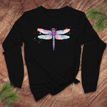 Black long-sleeve shirt with a watercolor dragonfly design on a wooden surface.
