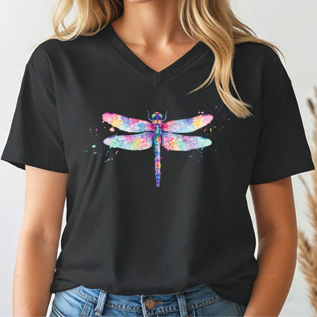 Black t-shirt with a watercolor dragonfly design worn by a person.