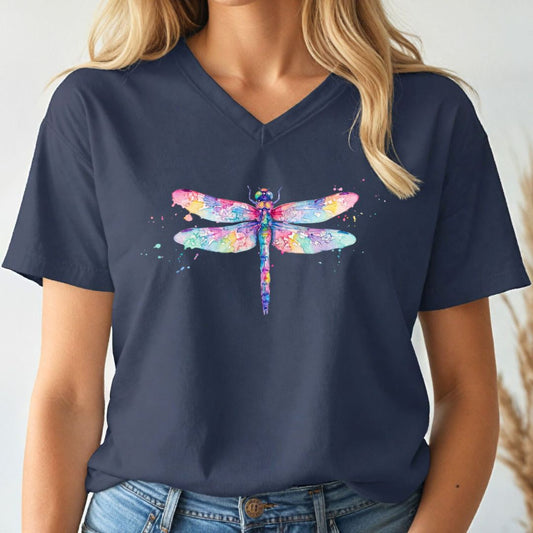 Navy blue t-shirt with a watercolor dragonfly design worn by a person.