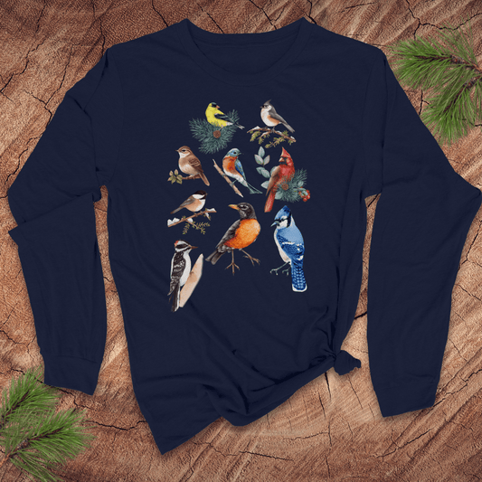 Navy blue long-sleeve shirt with bird illustrations on a wooden surface