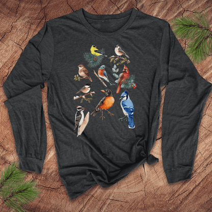 Dark long-sleeve shirt with bird illustrations on a wooden surface